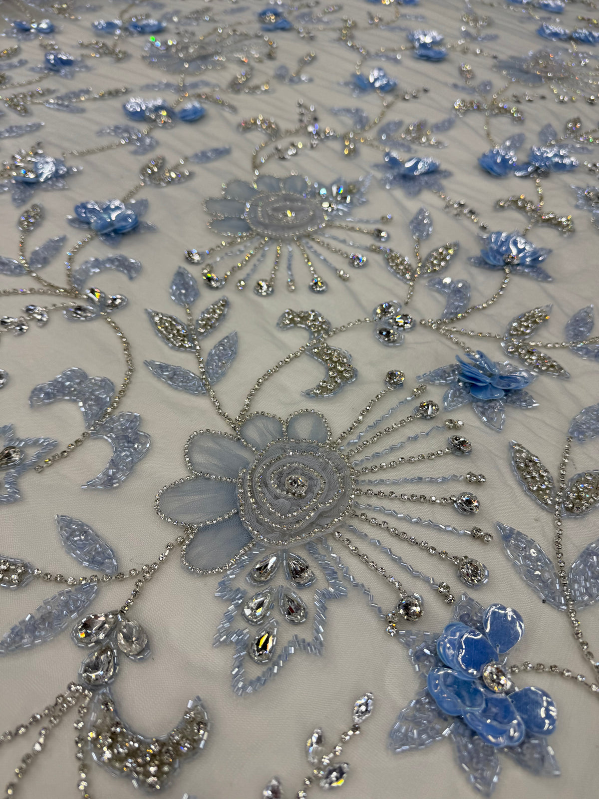 Broderie pe tul bleu Model K2205, latime 140 cm, cu flori 3D, cristale si margele premium/la metru