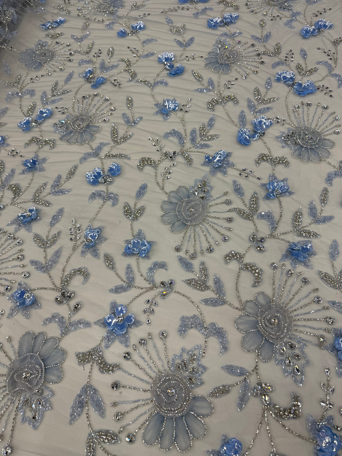 Broderie pe tul bleu Model K2205, latime 140 cm, cu flori 3D, cristale si margele premium/la metru