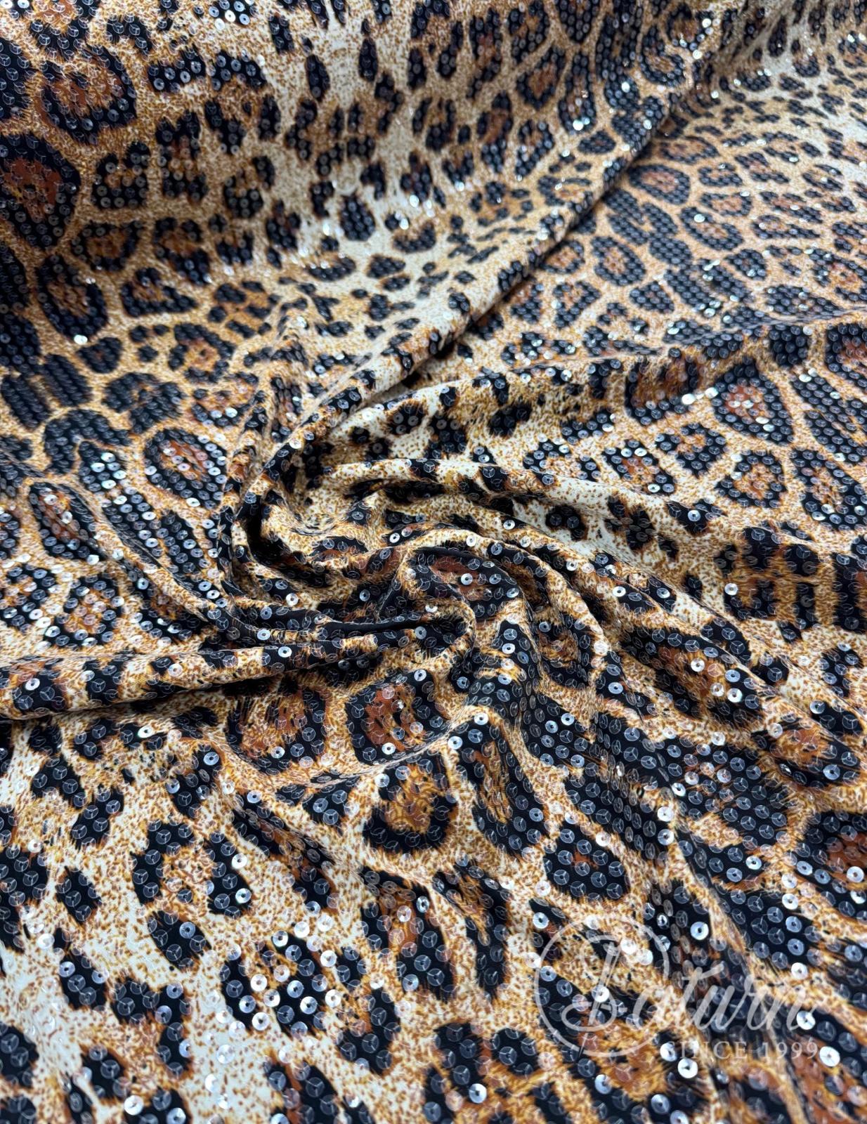 Material lycra elastic calitate superioara cu paiete leopard – ideal pentru rochii spectaculoase MERCERIE SATURN