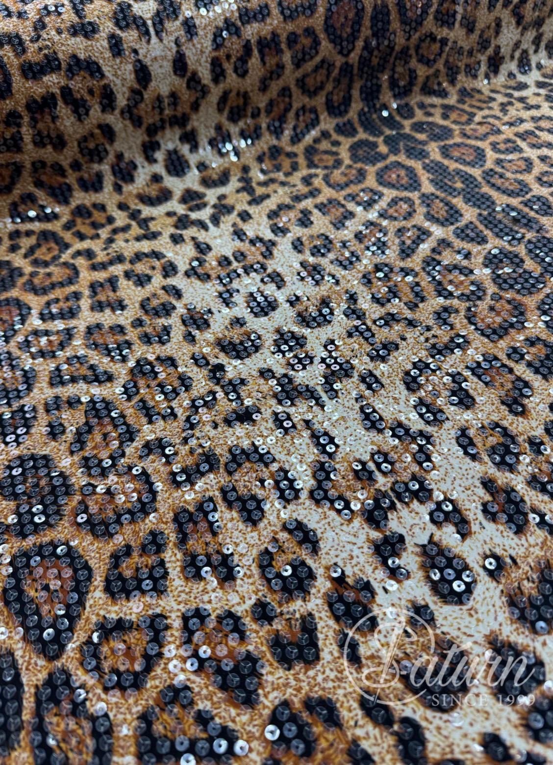 Material lycra elastic calitate superioara cu paiete leopard – ideal pentru rochii spectaculoase MERCERIE SATURN